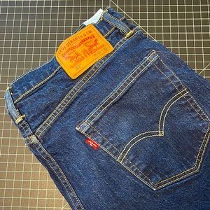Levi’s 502 style - dark blue wash. Stretch Jean. 33 x 32 excellent condition.